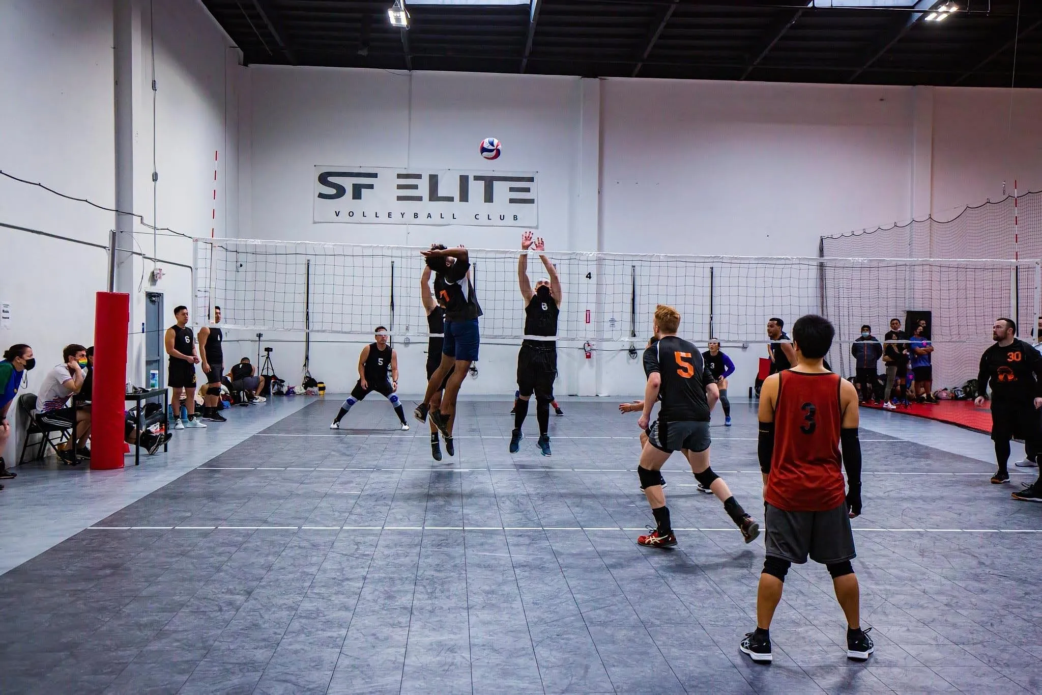 Action shot from a beach volleyball game.